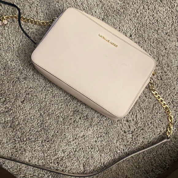 Michael Kors Handbags - Cute light pink mk purse . Can use as crossbody .